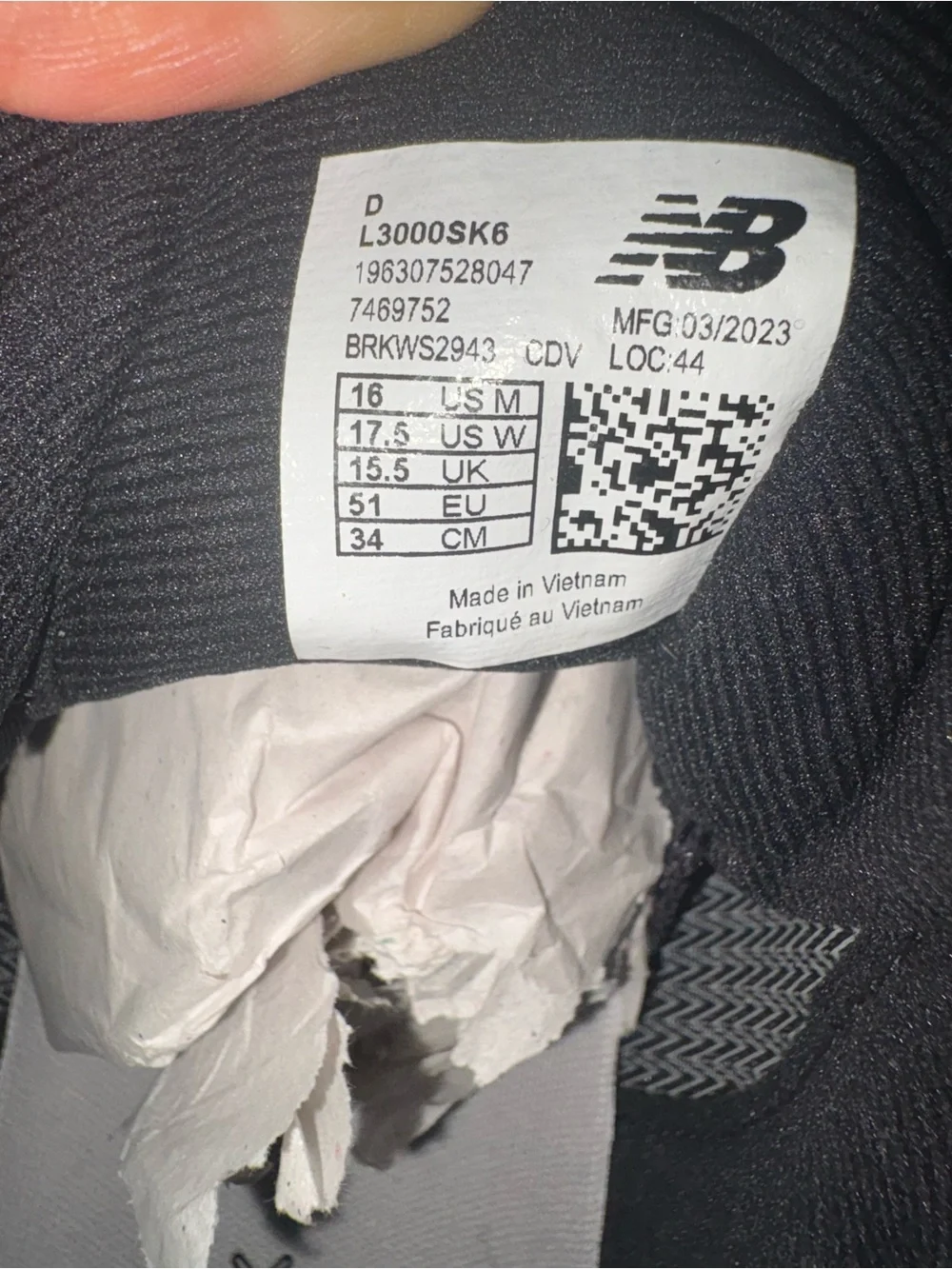 New Balance Men’s Black and White Baseball Cleats with Metal Spikes